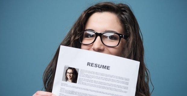 Woman holding her resume