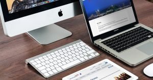 Laptop, desktop and tablet with airline websites