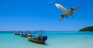 airplane over tropical seas